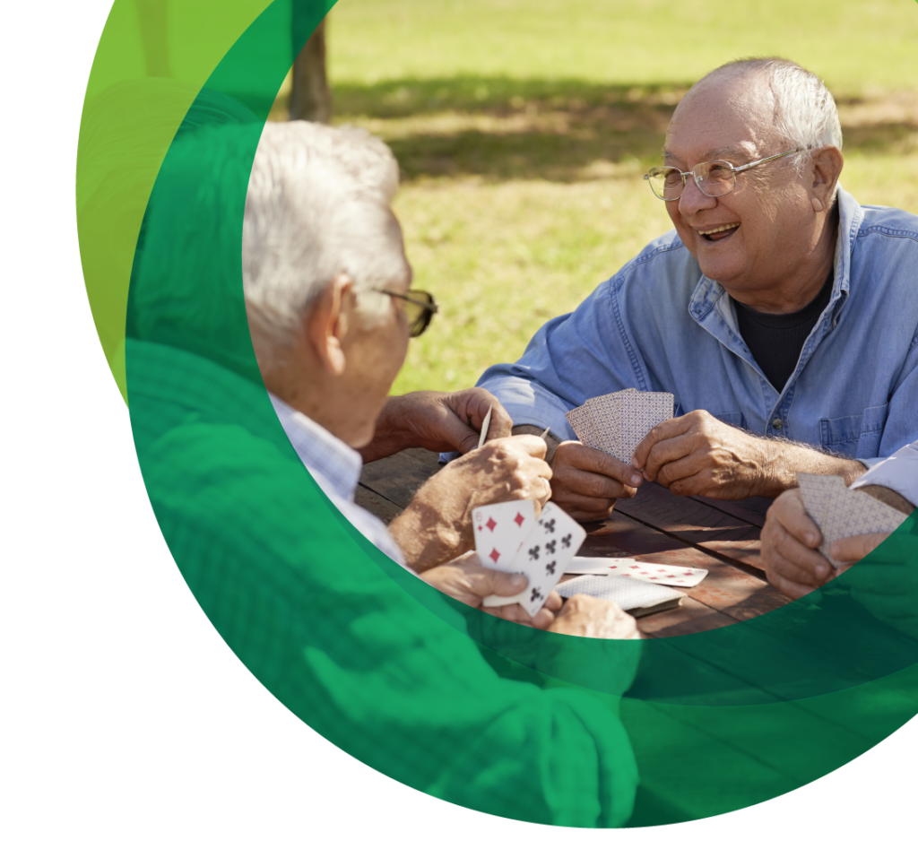 old men playing cards outside care Insurance